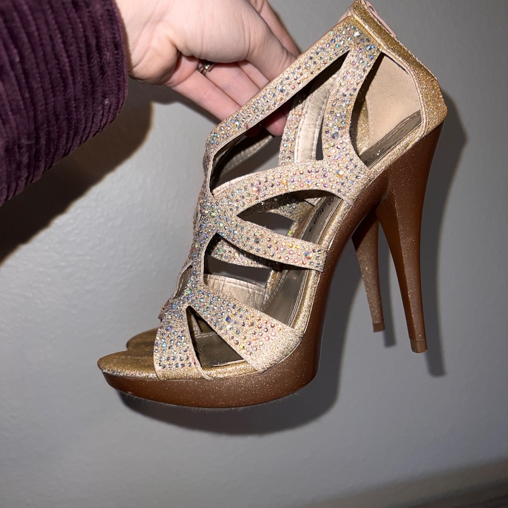 Stunning studded rhinestone 6 inch heels originally from a boutique dress shop.